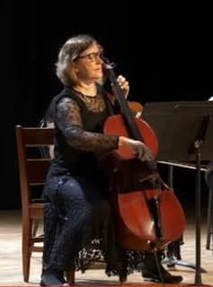 Barbara Armstrong performing on cello